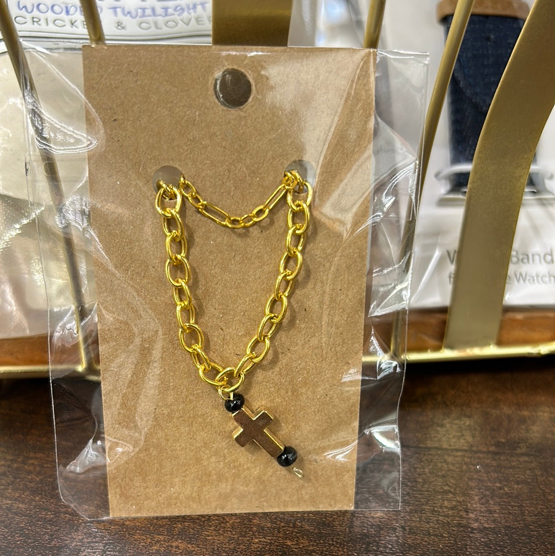 Collar de cruz en capas de oro